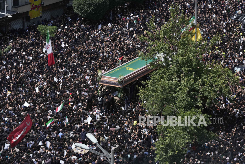 Iring-iringan pemakaman Presiden Iran, Ebrahim Raisi. Daftar calon presiden Iran akan diumumkan pada 11 Juni 2024.