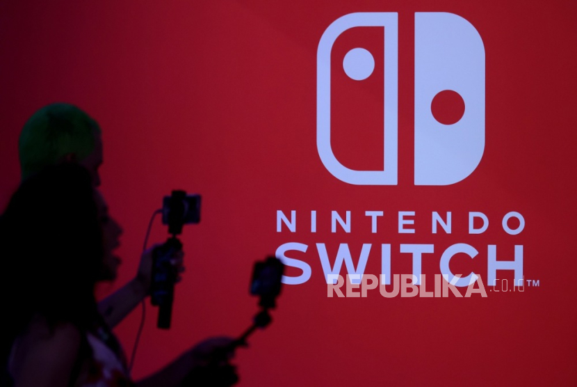 The logo of Nintendo Switch is seen at their booth during the Gamescom gaming convention in Cologne, Germany, 23 August 2023. The Gamescom gaming convention, the largest games fair in the world gathering the most important international players, runs from 23 to 27 August 2023.  