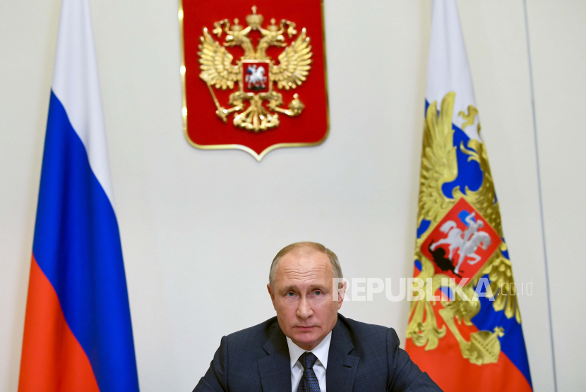 Presiden Rusia Vladimir Putin. Kremlin mengatakan pada Selasa (5/1) bahwa Rusia dan Jerman sedang membicarakan kemungkinan produksi vaksin Covid-19 bersama.