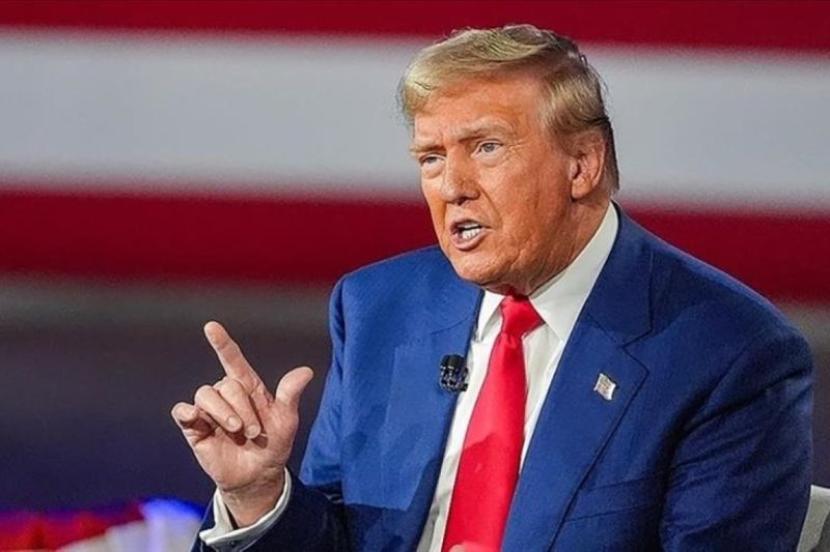 Trump: 'Siapa pun yang menyerang AS akan kami buru dan hancurkan'.