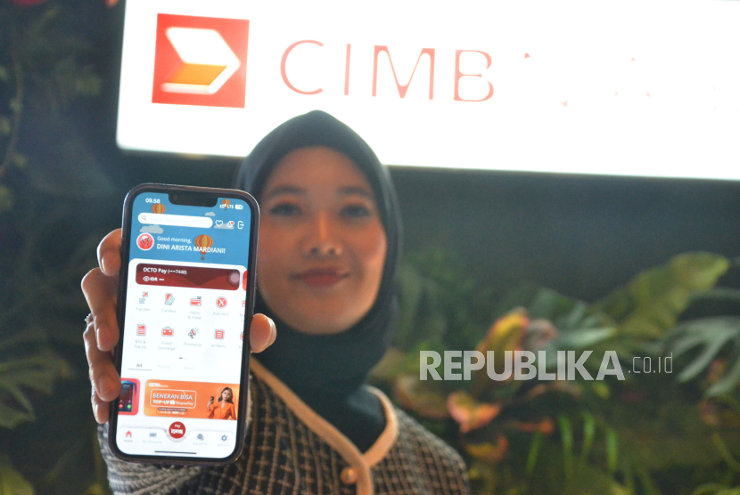 Layanan OCTO Pay milik CIMB Niaga. CIMB Niaga mencatatkan laba sebelum pajak konsolidasi sebesar Rp 8,7 triliun sepanjang tahun 2024.