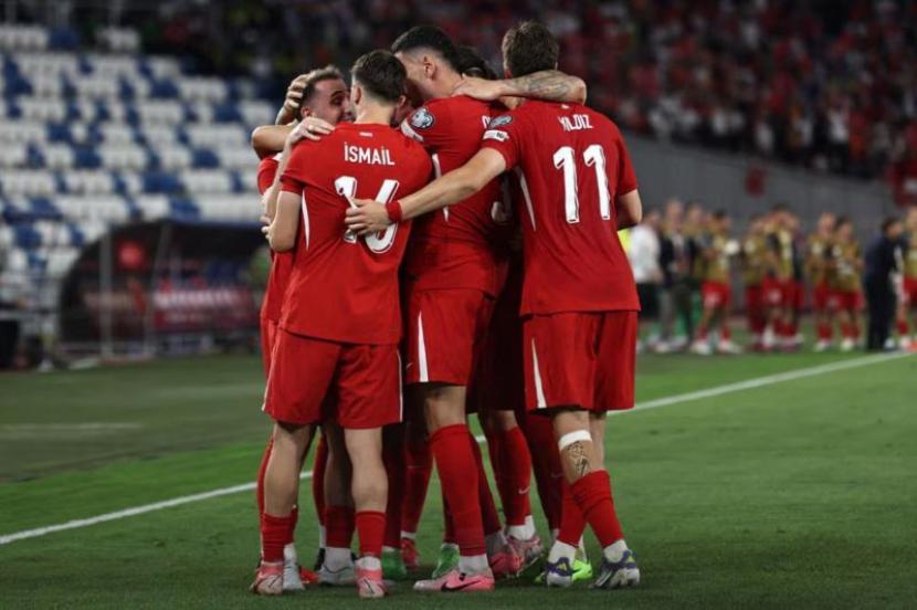 Turki raih kemenangan 3-2 Georgia, Wales menang tipis atas Kazakhstan.