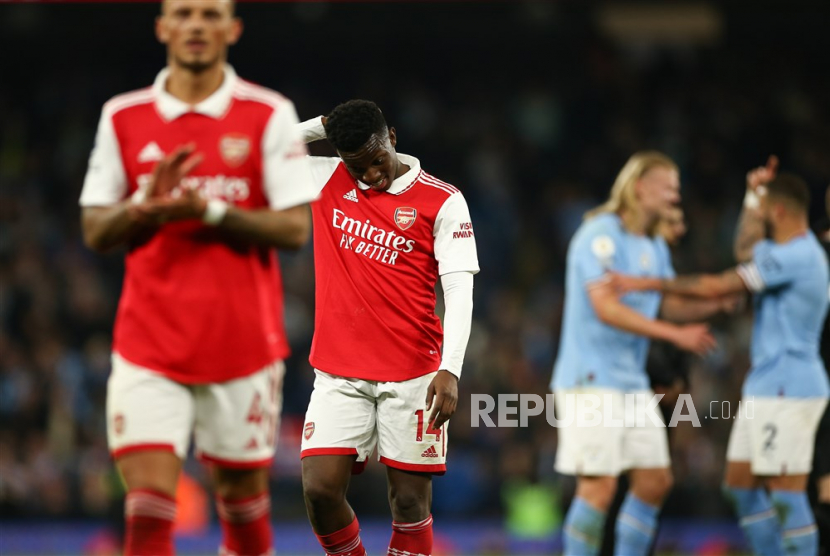 Ben White (L) and Eddie Nketiah of Arsenal (R) react at full time after the English Premier League soccer match between Manchester City and Arsenal FC at the Etihad Stadium in Manchester, Britain, 26 April 2023.  