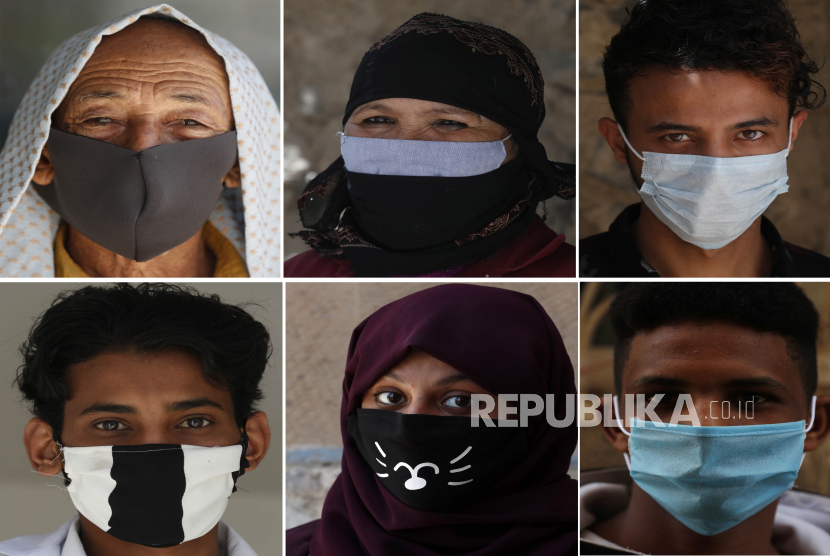 Foto kombo enam warga Yaman mengenakan masker saat wabah SARS-CoV-2 virus Corona Covid-19, di Sanaa, Yaman, Senin (30/3).