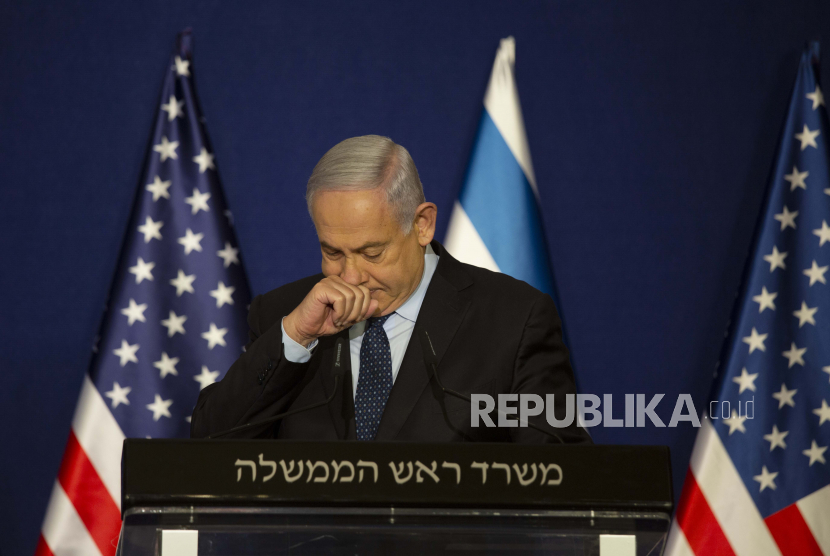Netanyahu Kunjungi Arab Saudi Secara Rahasia?. Foto:  Perdana Menteri Israel Benjamin Netanyahu berhenti saat pernyataan bersama dengan Menteri Luar Negeri AS Mike Pompeo di Yerusalem, Kamis, 19 November 2020.