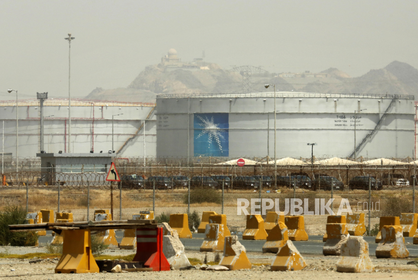 FILE - Storage tanks are seen at the North Jiddah bulk plant, an Aramco oil facility, in Jiddah, Saudi Arabia, on March 21, 2021. Saudi Arabia