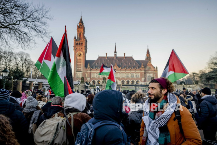 Palestinian activists rally prior to the hearing at the International Court of Justice (ICJ), on a genocide complaint by South Africa against Israel, in The Hague, The Netherlands, 11 January 2024. Interested parties speak out in favor of the Palestinian or Israeli cause.  