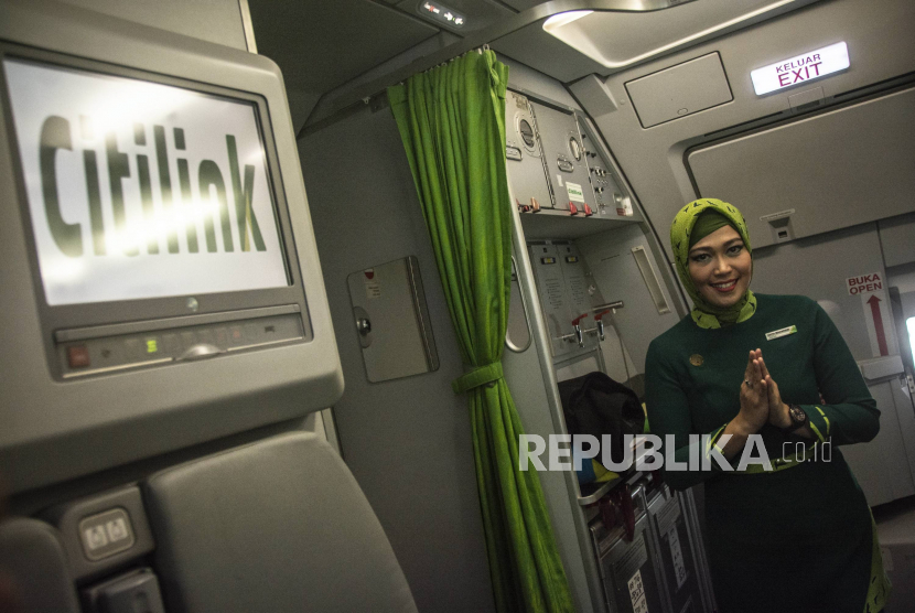 Soal Jilbab Pramugari, Anggota DPR: Penggunaan Jilbab di Manapun Seharusnya Boleh. Foto:   Ilustrasi Pramugari Hijab/Pramugari berjilbab