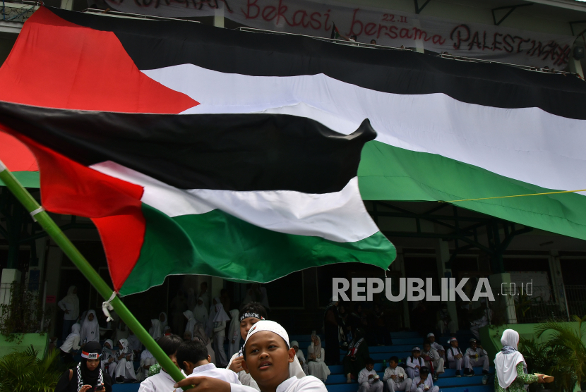 Ilustrasi pawai mendukung kemerdekaan Palestina.