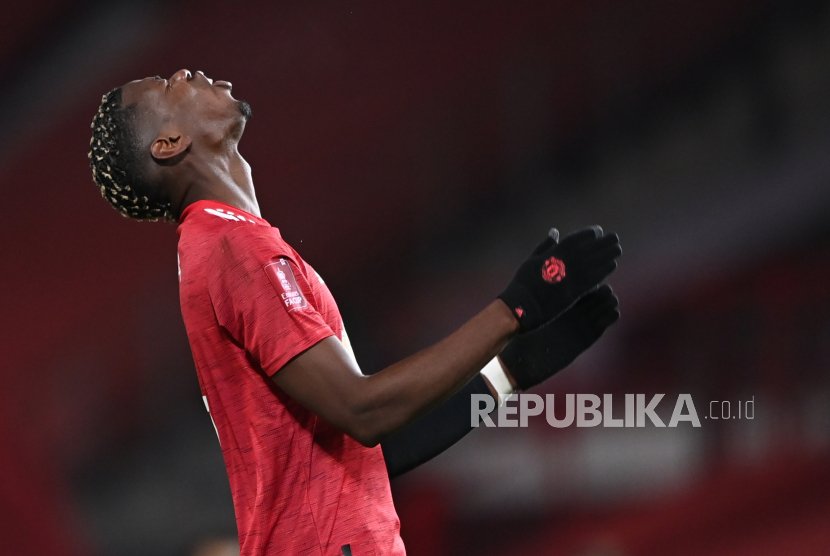  Reaksi gelandang Manchester United Paul Pogba saat pertandingan putaran keempat Piala FA melawan Liverpool.