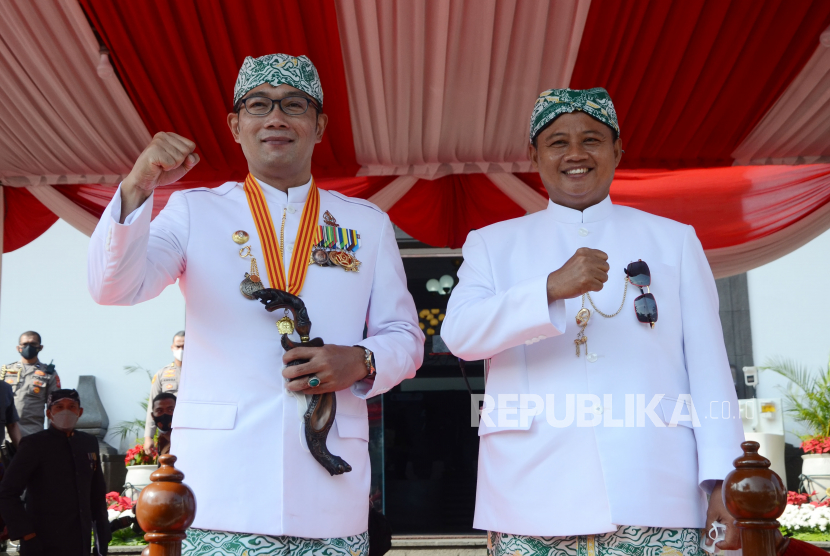 Gubernur Jawa Barat Ridwan Kamil bersama Wakil Gubernur Jawa Barat Uu Ruzhanul Ulum. Uu ingin PPP mengusung Ridwan Kamil menjadi capres.