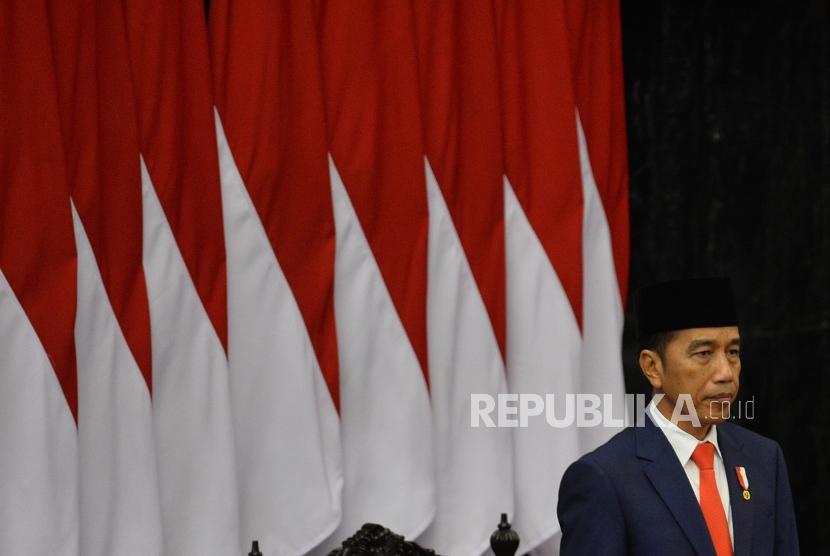 Presiden Joko Widodo saat acara pelantikan Presiden dan Wakil Presiden periode 2019-2024 di Gedung Nusantara, kompleks Parlemen, Senayan, Jakarta, Ahad (20/10).