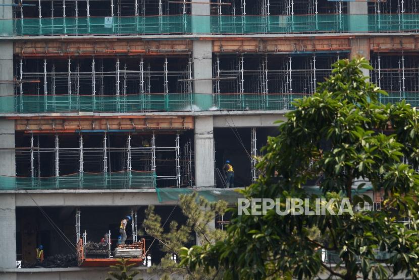 Pemkot Surabaya menggratiskan biaya mengurus Sertifikat Laik Fungsi (SLF) bangunan gedung.  Foto: Pertumbuhan Ekonomi Indoensia. Gedung bertingkat (ilustrasi).