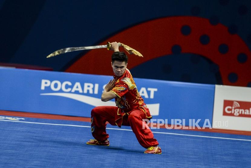 Atlet Wushu Indonesia Edgar Xavier mengharapkan PON Papua 2020 diundur karena wabah corona. 
