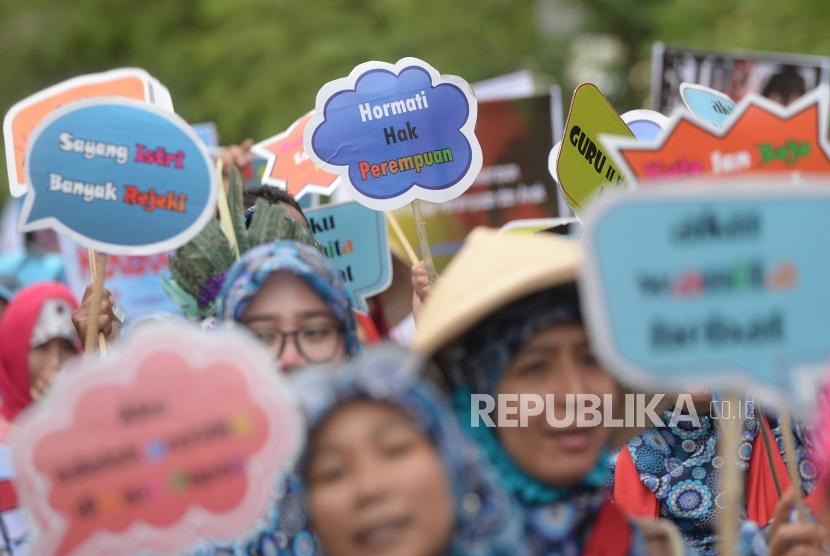 Ilustrasi Kampanye Antikekerasan Perempuan dan Anak. Kekerasan terhadap perempuan, termasuk kekerasan dalam rumah tangga, merupakan pelanggaran hak asasi manusia