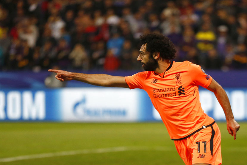  Selebrasi pemain Liverpool Mohamed Salah setelah berhasil menjebol gawang Maribor pada laga Liga Champions di Stadion Ljudski Vrt, Maribor, Selasa (17/10). 