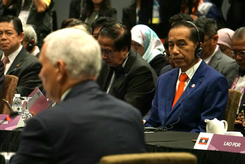President Joko Widodo (right)