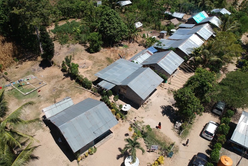 Daerah Transmigrasi Gorontalo: Foto udara lokasi pemukiman dan lahan transmigrasi di Desa Puncak, Kabupaten Gorontalo, Gorontalo, Selasa (5/3/2019).