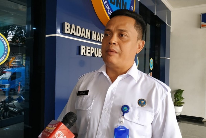 Kabid Humas Badan Narkotika Nasional (BNN),  Kombes Pol Sulistyo Pudjo membahas soal rehabilitasi AA di Kantor BNN, Cawang, Jakarta Timur,  Kamis (7/3). 