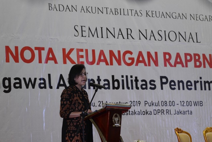 Menteri Keuangan Sri Mulyani memberikan pidato pada seminar Nasional di Kompleks Parlemen Senayan, Jakarta Pusat, Rabu (21/8/2019).