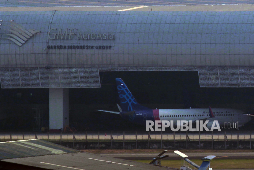 Sebuah pesawat Sriwijaya berada di hanggar GMF milik Garuda Indonesia di Bandara Soekarno Hatta, Tangerang, Banten, Selasa (1/10/2019).