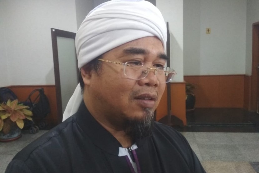 Ketua MUI Sumatra Barat, Gusrizal Gazahar, menyatakan vaksinasi bukan satu-satunya cara