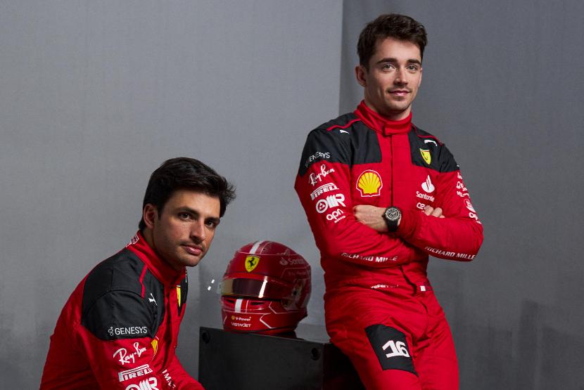 A handout photo made available by the Scuderia Ferrari press office shows drivers Charles Leclerc (R) and Carlos Sainz Jr. (L) posing during the presentation of the team