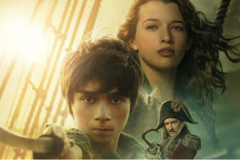 Aktor Jude Law (Captain Hook), Ever Anderson (Wendy), dan Alexander Molony (Peter Pan) dalam poster film Peter Pan & Wendy.