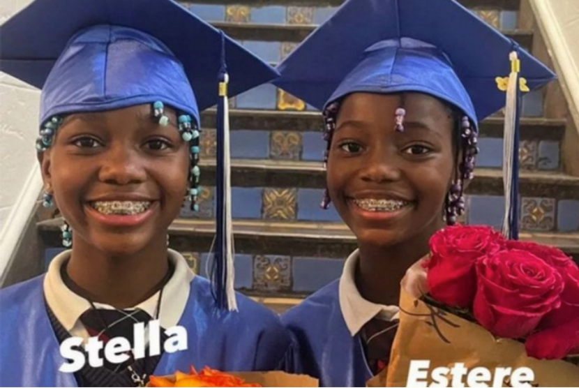 Anak bungsu Madonna, si kembar Stella dan Estere, mengenakan toga saat upacara kelulusannya dari sekolah dasar.