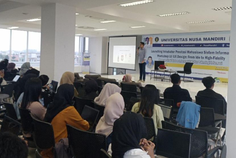Program Studi Sistem Informasi Universitas Nusa Mandiri (UNM) kembali mengadakan workshop atau pelatihan pengembangan desain aplikasi mobile melalui User Interface (UI) dan user experience (UX).