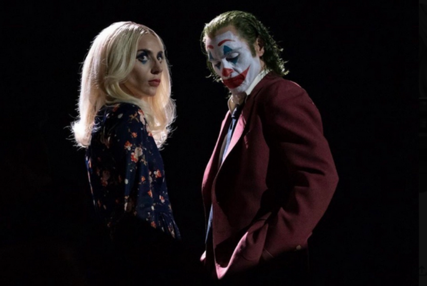 Lady Gaga dan Joaquin Phoenix dalam foto yang dibagikan sutradara Todd Phillips untuk film Joker 2.