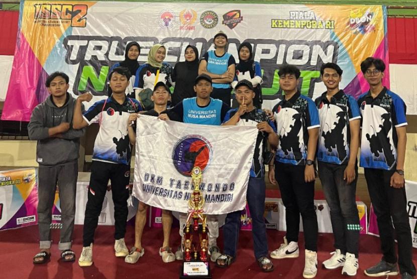 Prestasi gemilang telah diraih oleh mahasiswa Kampus Digital Bisnis Universitas Nusa Mandiri (UNM) dalam ajang prestisius Kejuaraan Taekwondo 