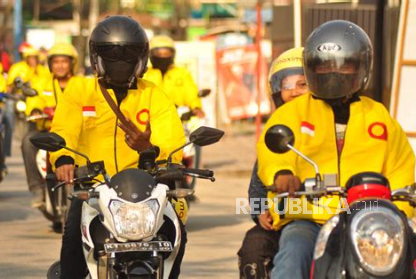 Pengemudi ojek online Maxim. Maxim memberikan sejumlah kriteria penerima bonus hari raya.