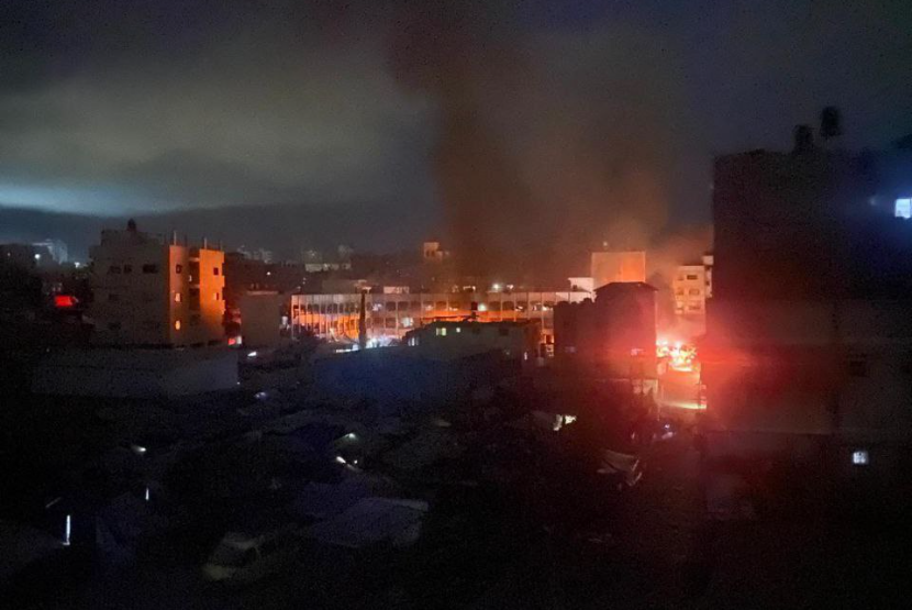 Sekolah Fahmi al-Jarjawi di al-Daraj di Kota Gaza yang terbakar setelah dibom militer Israel, Senin (26/5/2025).