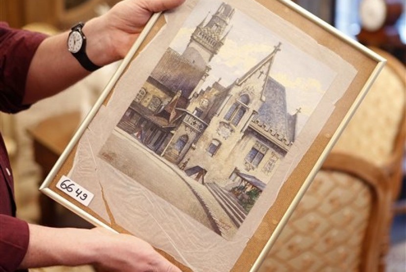 A 100 year old picture titled “The Old City Hall” that - as the auction house said - was painted by Adolf Hitler is displayed in an auction house in Nuremberg, Germany. 
