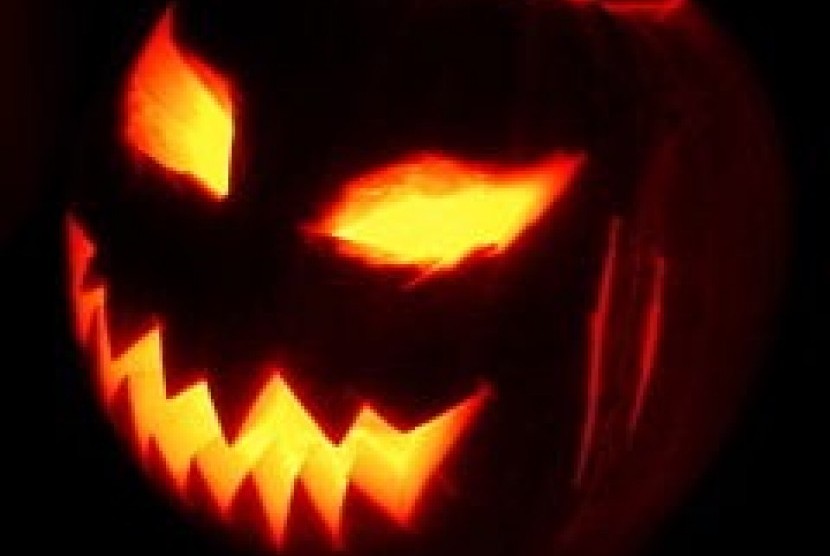 A jack-o'-lantern, one of the symbols of Halloween representing the souls of the dead. (Illustration)