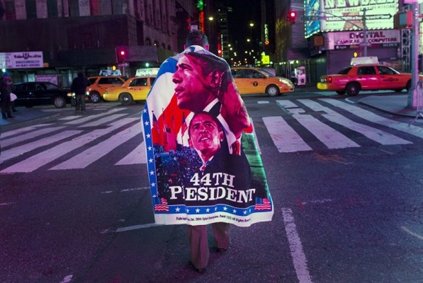 A man exits after watching U.S. President Barack Obama's acceptance speech broadcast live in Times Square following his re-election in New York November 7, 2012.  