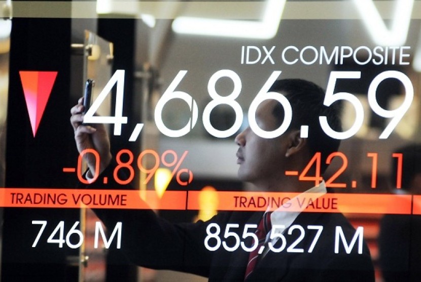 A man stands near electronic board showing Jakarta Composite Index on Monday. (file photo)