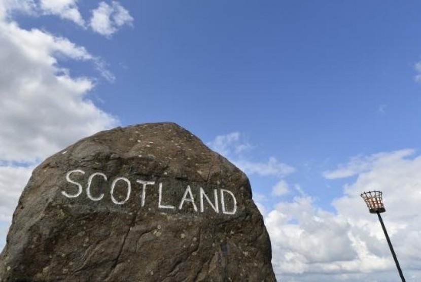 A marker stone is seen at Carter Bar in the Scottish Borders August 22, 2013.