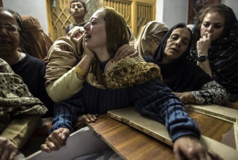 A mother mourns her son Mohammed Ali Khan, 15, a student who was killed during an attack by Taliban gunmen on the Army Public School, at her house in Peshawar December 16, 2014. 