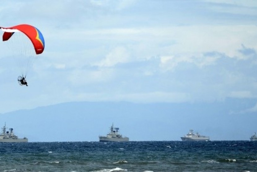 A paramotor athlete maneuvers during the last preparation of Sail Raja Ampat in West Papua on Friday. 