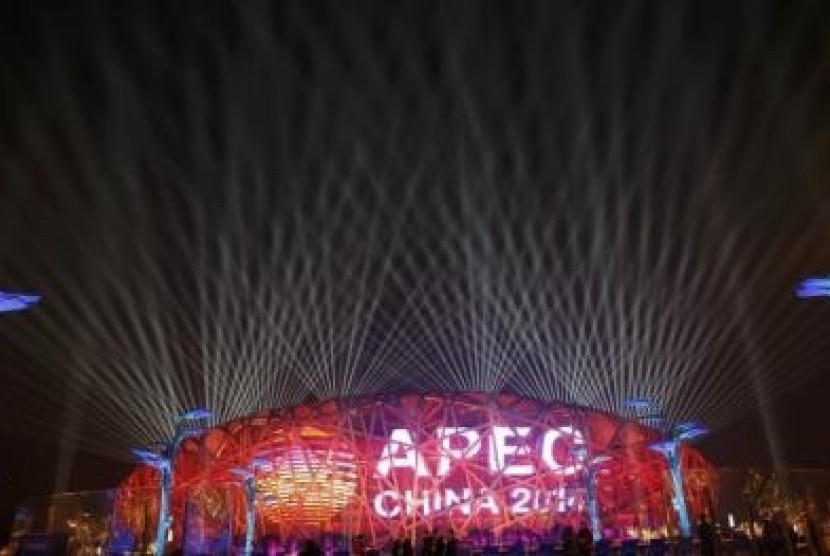 A screen displays the APEC logo on the National Stadium, or the 