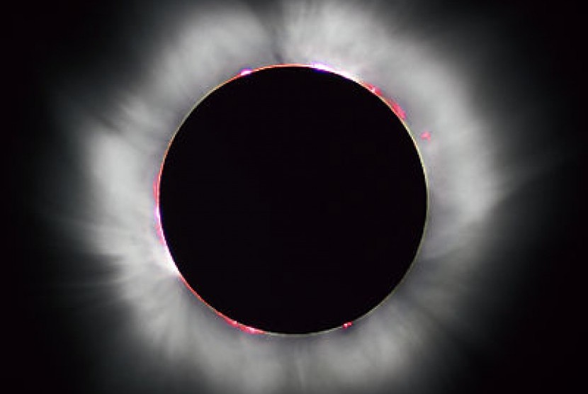A total solar eclipse occurs where the moon completely covers the sun's disk. (illustration)