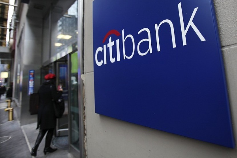 A woman walks into a Citibank branch in New York in this 2012 file photo. 