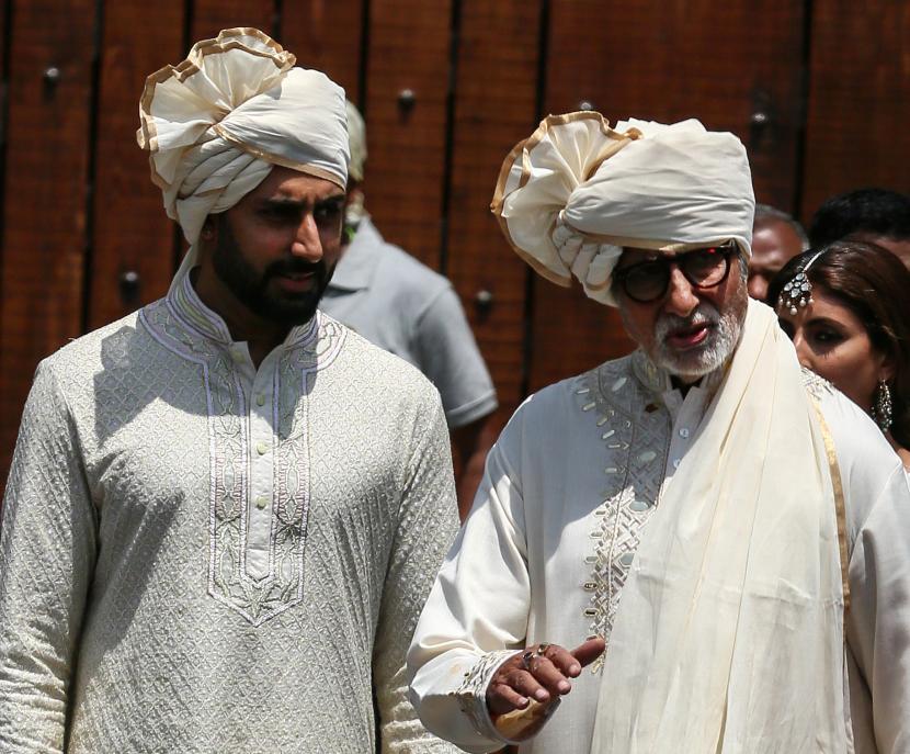 Abhishek Bachchan dan Amitabh Bachchan (kanan) dipastikan positif Covid-19.
