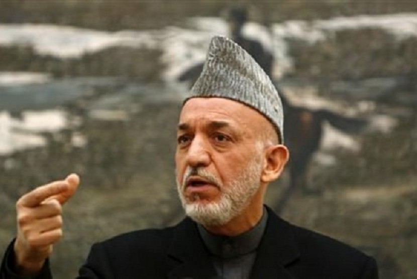 Afghan President Hamid Karzai speaks during a news conference in Kabul December 8, 2012.  