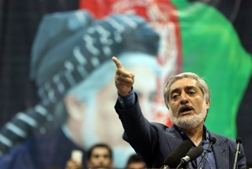 Afghan presidential candidate Abdullah Abdullah speaks during a gathering of his supporters in Kabul, Afghanistan, Tuesday, July 8, 2014. 