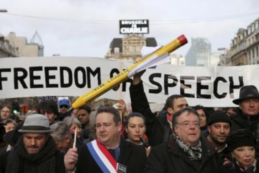 Aksi simpati terhadap korban penembakan Charlie Hebdo juga dilakukan di jalanan kota Brussel, Belgia, Ahad (11/1) waktu setempat.