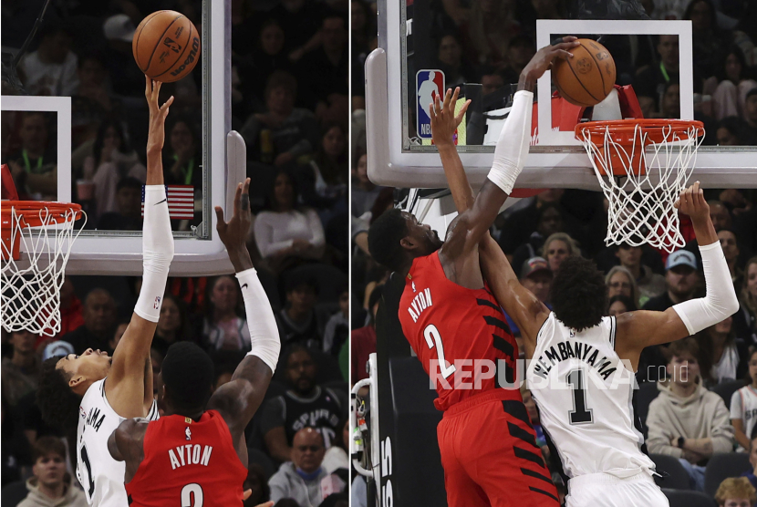 Aksi Victor Wembanyama (kostum putih) saat membela San Antonio Spurs mengalahkan  Portland Trail Blazers 114-94 pada pertandingan di kompetisi NBA, Ahad (22/12/2024) WIB. Wembanyama mencetak rekor dengan 30 poin dan 10 blok pada laga ini.