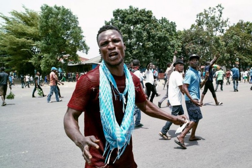 Aktivis oposisi Kongo saat berdemo menuntut Presiden Joseph Kabila turun di Ibu Kota Kinshasa, Senin, 19 September 2016.